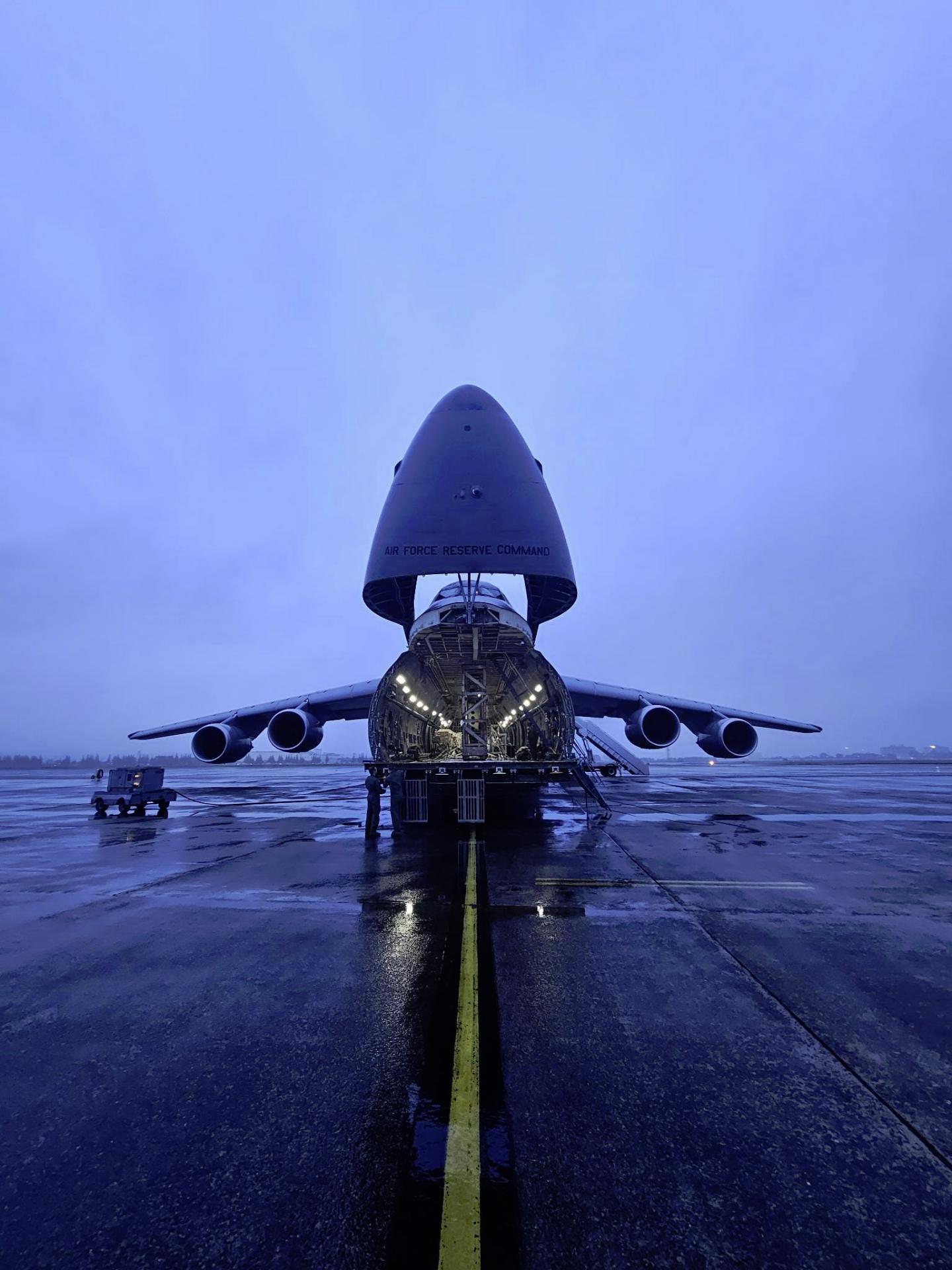 C-5 with nose cargo door open at dusk