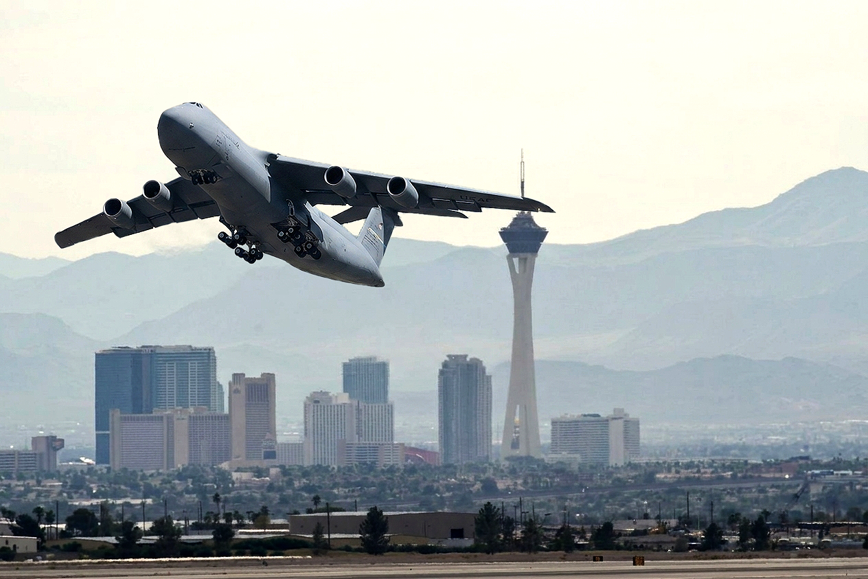 C-5 taking off over Las Vegas skyline